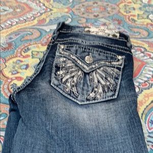 Miss Me. This pair of jeans are low rise(skinny)